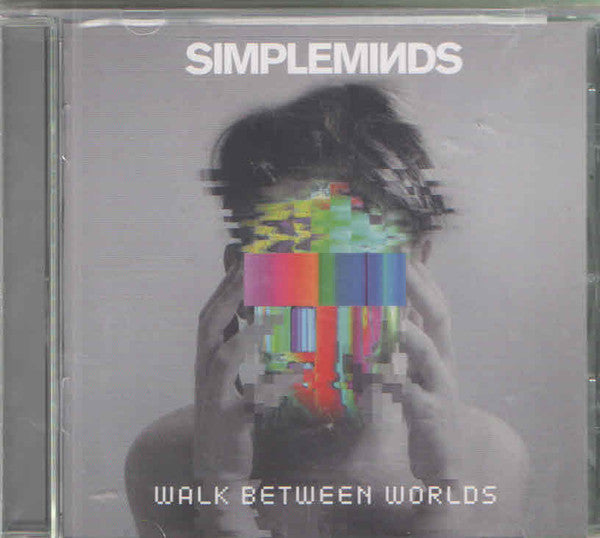 SIMPLE MINDS - WALK BETWEEN WORLDS