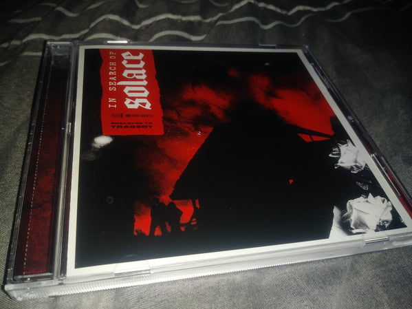 IN SEARCH OF SOLACE - ENSLAVED TO TRAGEDY