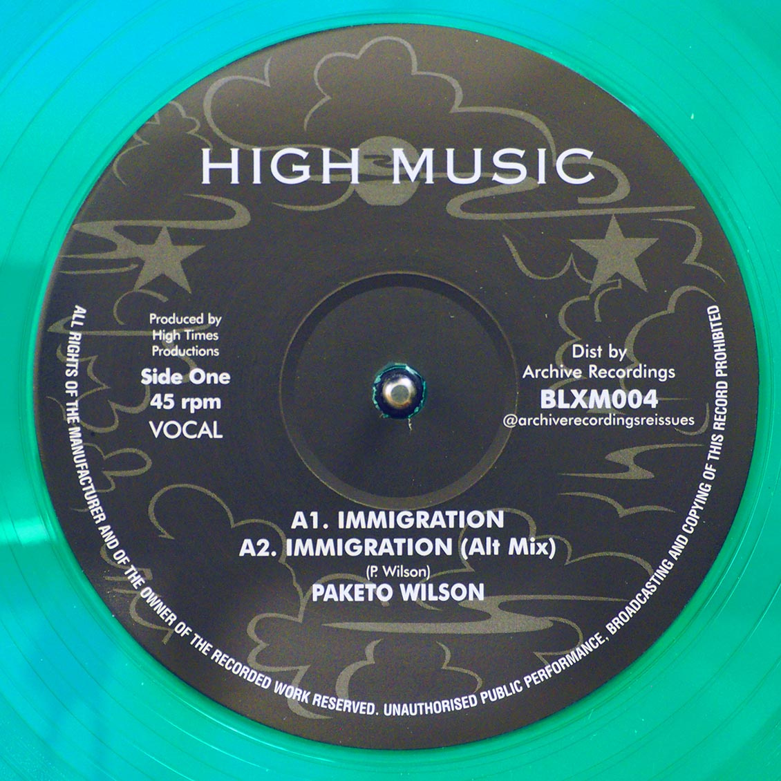 Paketo Wilson - Immigration; Paketo Wilson - Immigration (Alternative Mix)  /  High Times Players - Immigration Version (colored vinyl)