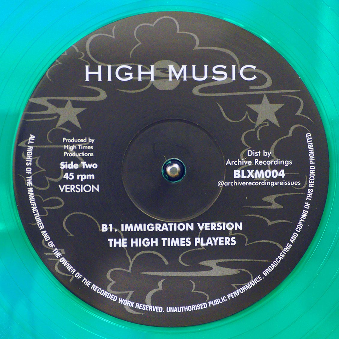 Paketo Wilson - Immigration; Paketo Wilson - Immigration (Alternative Mix)  /  High Times Players - Immigration Version (colored vinyl)