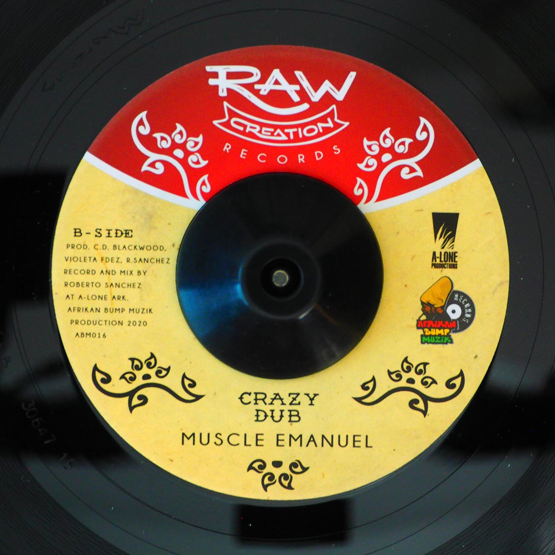 Muscle Emanuel - Crazy World  /  Afrikan Bump, Lone Ark Riddim Force - Crazy Dub