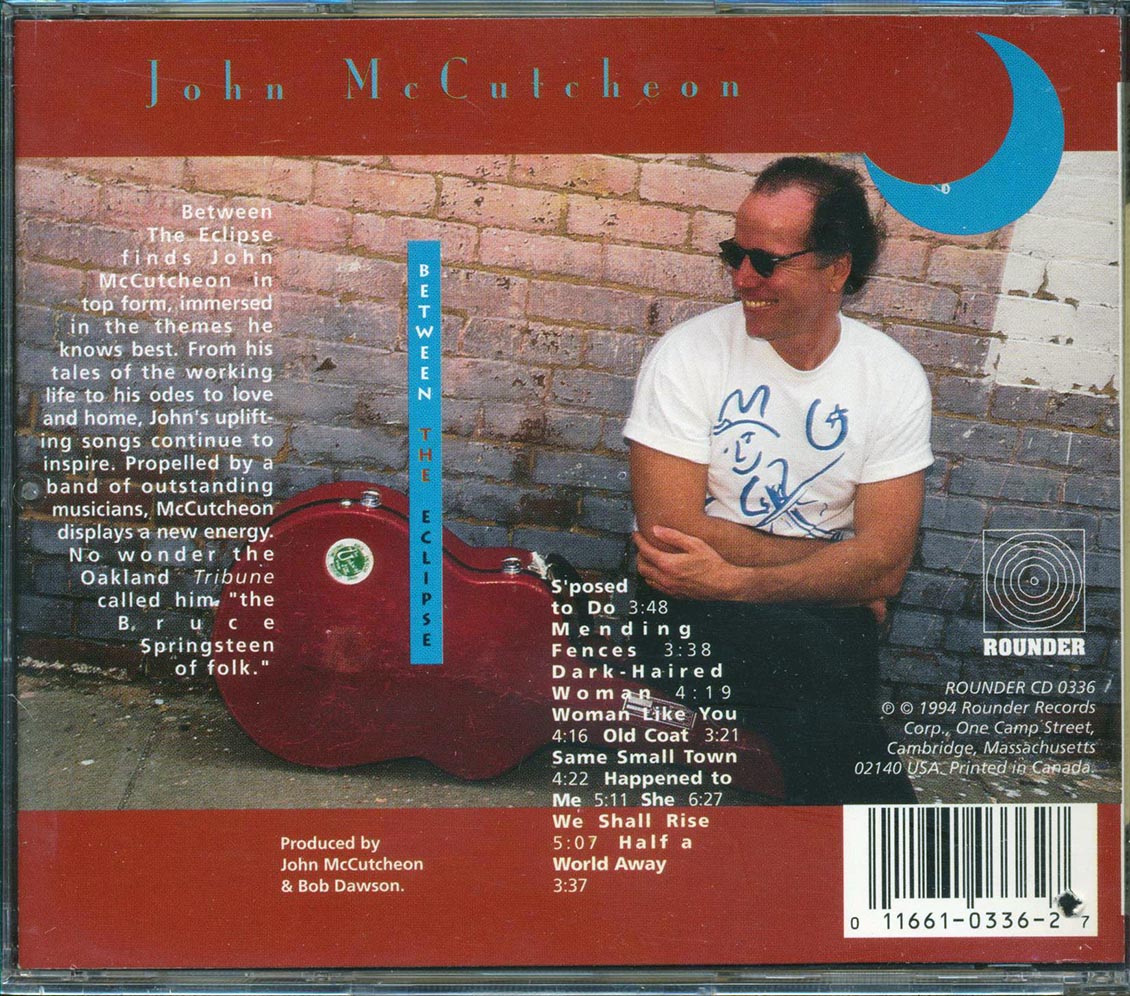 John McCutcheon - Between The Eclipse (marked/ltd stock)