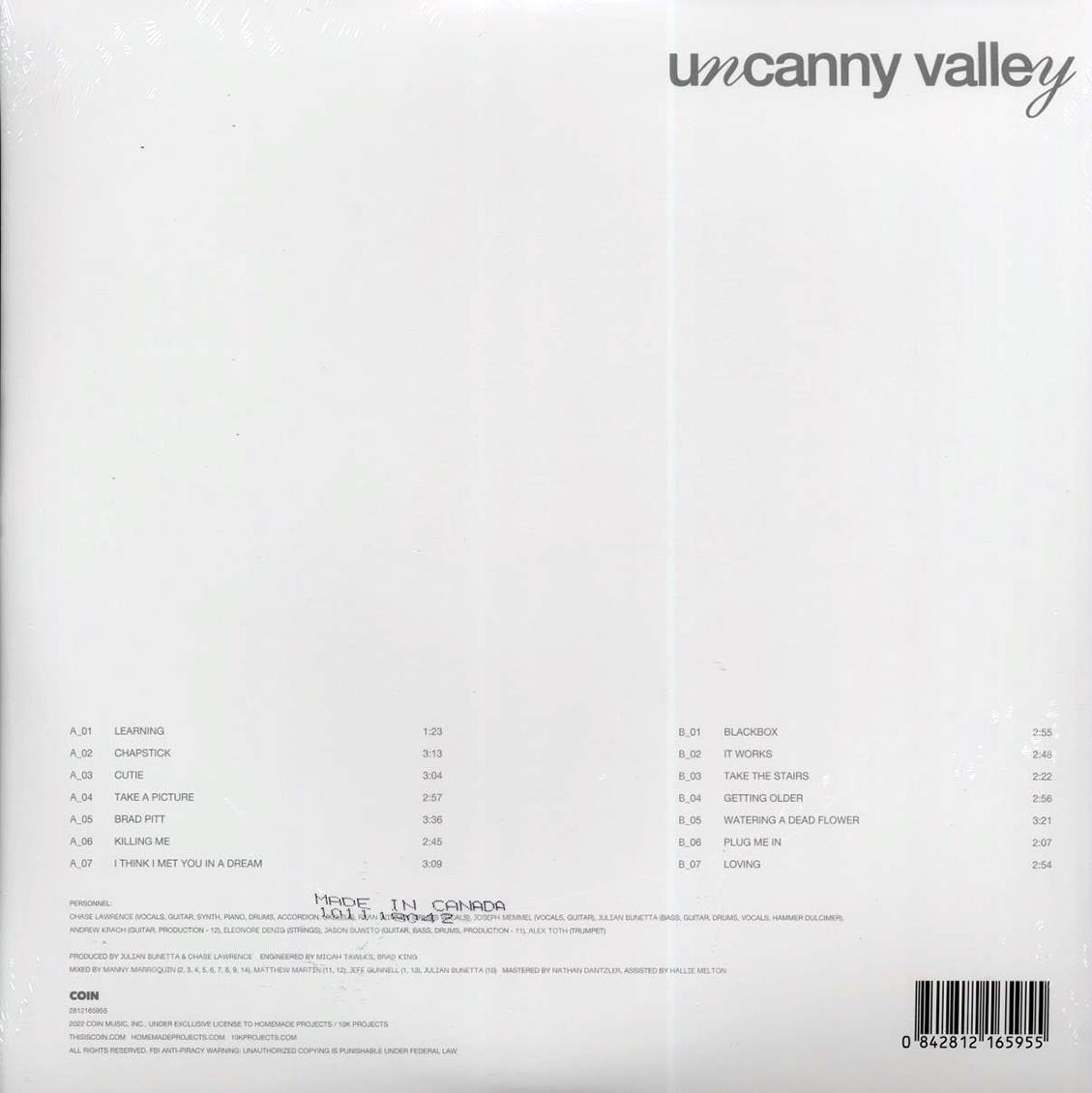 Coin - Uncanny Valley (die-cut jacket)