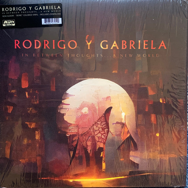 RODRIGO Y GABRIELA - IN BETWEEN THOUGHTS A NEW WORLD (BONE COLORED VINYL)