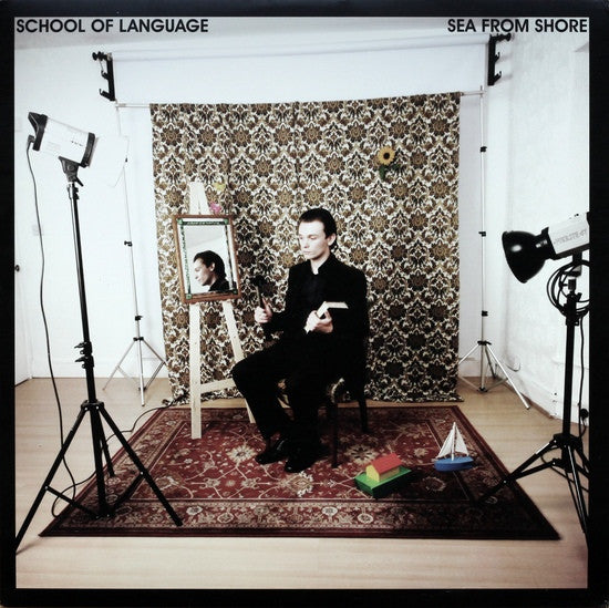 SCHOOL OF LANGUAGE - SEA FROM SHORE