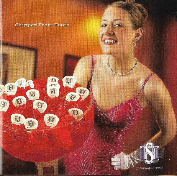 HOLT SCOTT - CHIPPED FRONT TOOTH