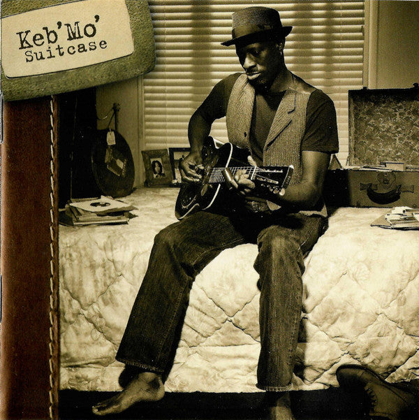 KEB' MO - SUITCASE